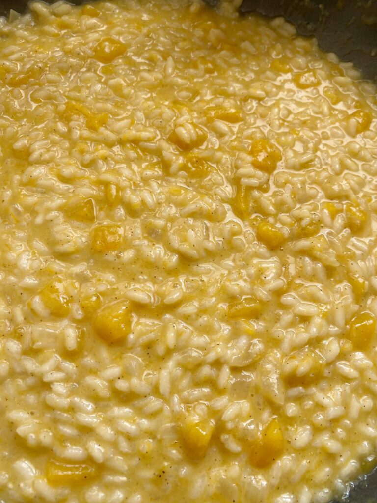 photo of risotto with pumpkin close up