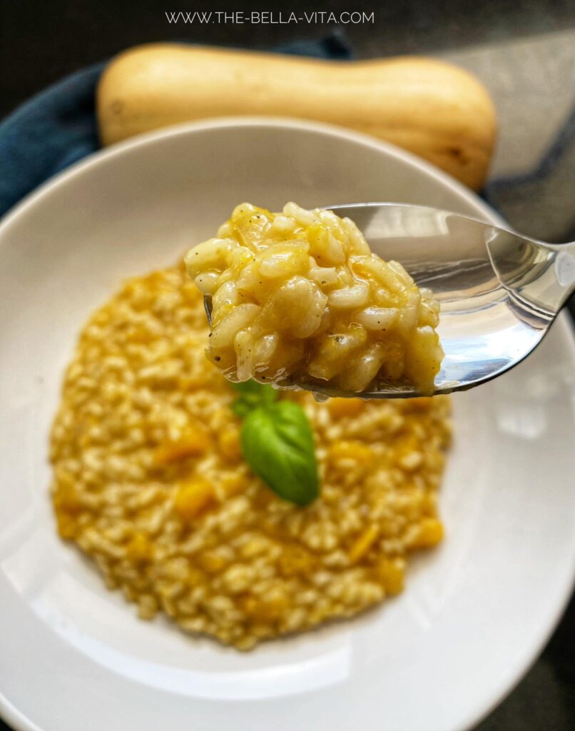 risotto with pumpkin scoop in the spoon