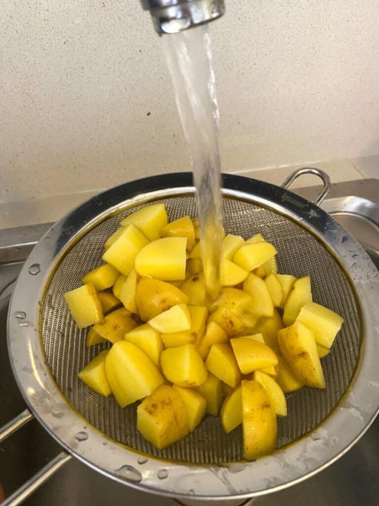 rinse the potatoes in cold water