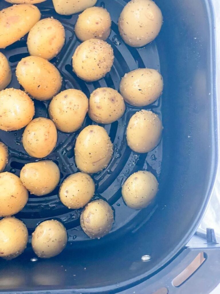 air fryer baby potatoes in the basket