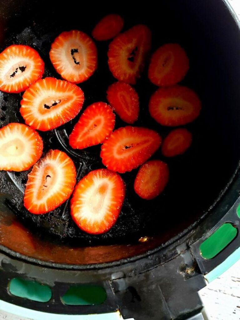 strawberries single layer inside the air fryer basket