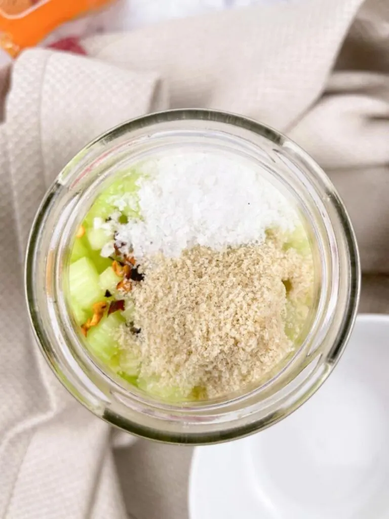 Celery in the jar with the spices, salt, pepper and sugar