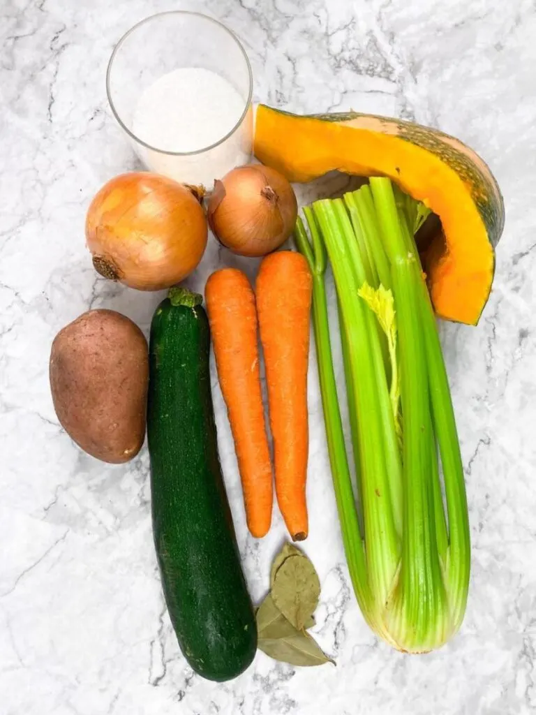 Ingredients base for bouillon -  Celery, zucchini, carrots, potatoes, pumpkin, onion, salt, bay leaf
