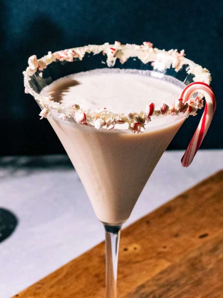  A cozy image of a beautifully garnished Baileys martini Christmas drink.
