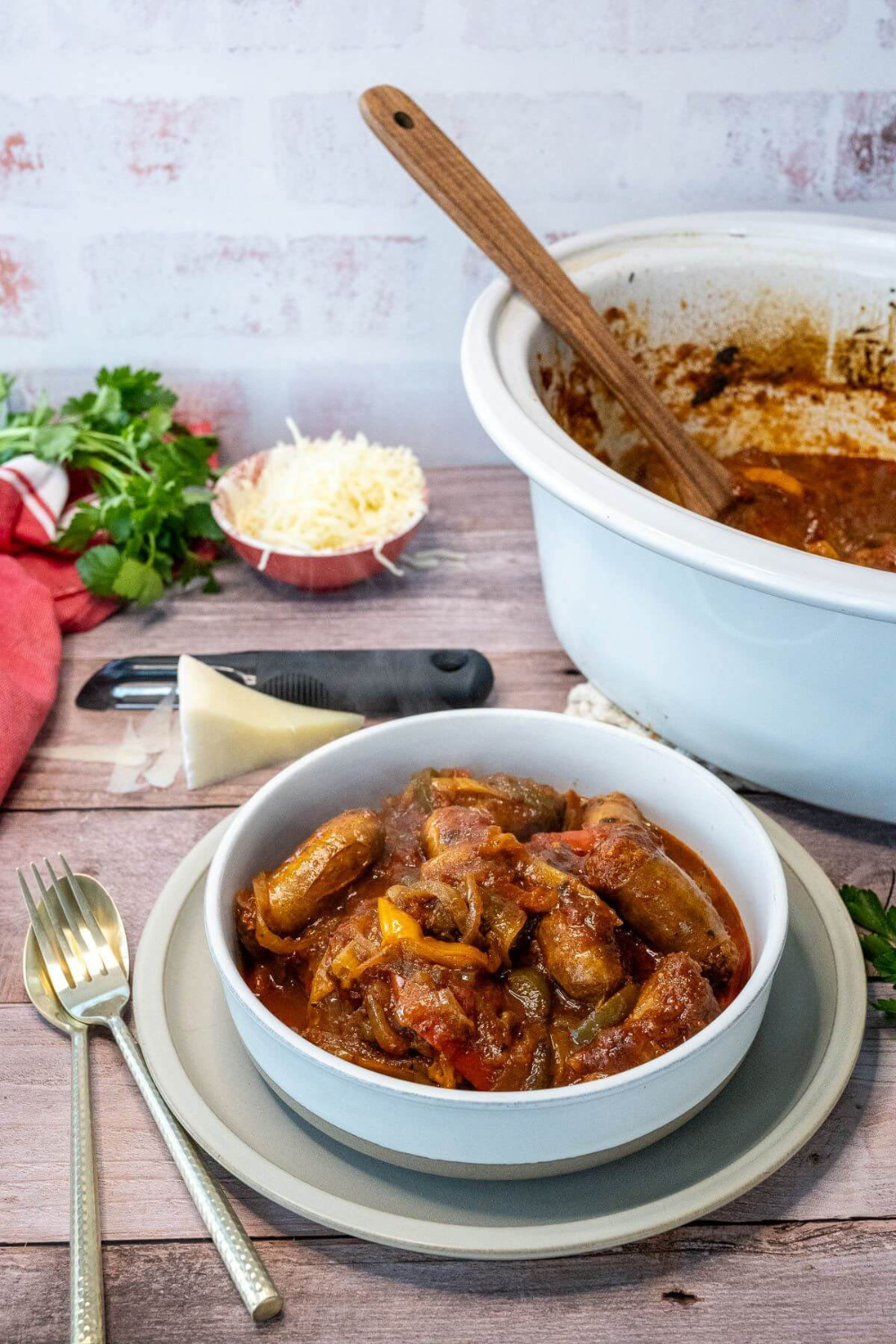 Sausage and peppers in a bowl, a fall crockpot recipe idea.