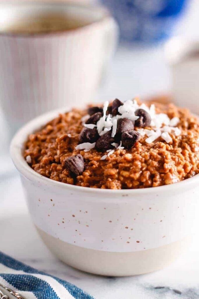Chocolate Almond Butter Overnight Oats Gluten Free Chocolate overnight oats in a bowl, topped with chocolate chips and coconut flakes. Overnight Oats Recipes.