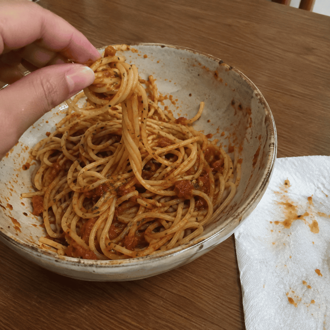 You don't cut long pasta, and you don't need a spoon