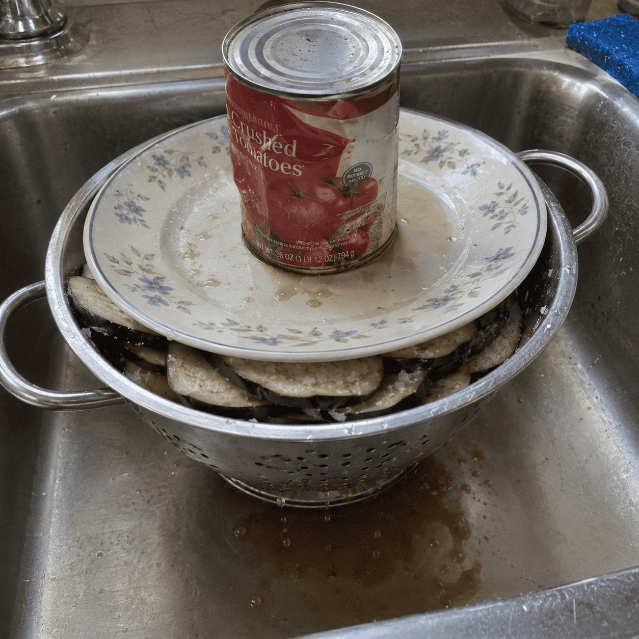 The Eggplants Sweating Under a Plate